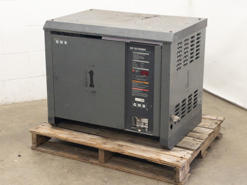 GNB SCR100-24-475T1Z industrial battery charger front-left view showing GNB branding and control panel, unit on pallet