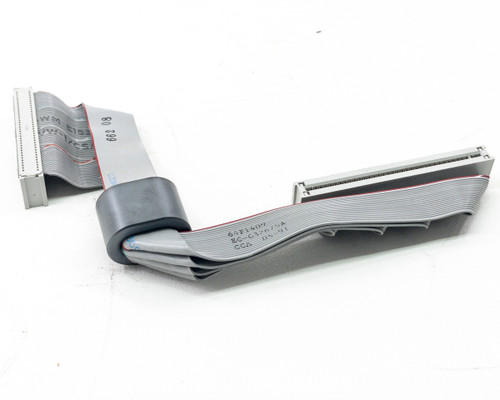 IBM 64F1409 ESDI hard drive ribbon cable – full cable assembly angled view showing both connectors and strain relief