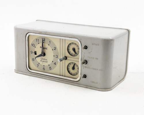 GE Hotpoint 3T38AAA1 Type T-38 Electric Range Timer – front-left three-quarter view showing clock face and two sub-dials