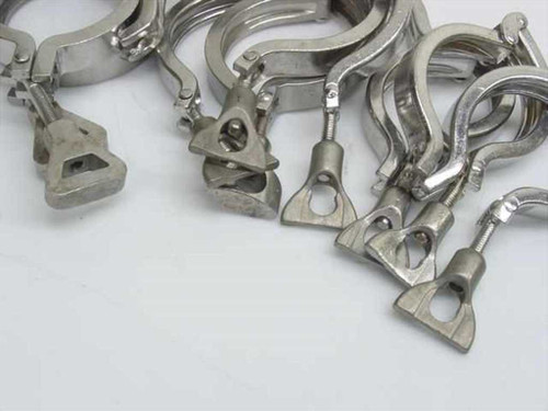 Close-up of Balzers Pall ISA flange clamp wing-nut latch and hinge hardware detail