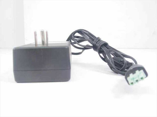 HP 0950-4392 AC Power Adapter — side profile view showing compact brick body, AC prongs, and 3-pin output cable