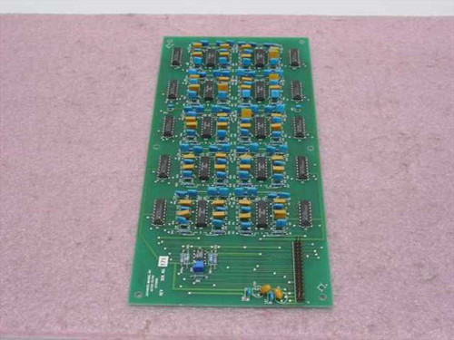 Advanced Imaging 9376908 Active Filter PCB — angled top view showing full board layout with rows of yellow capacitors and blue inductors
