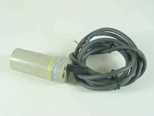 Omron E2K-C25ME1 Capacitive Proximity Switch Sensor full body view with attached gray lead cable