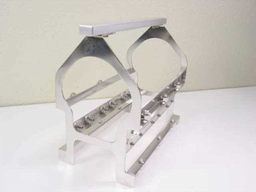 Applied Magnetics NL Block Carrier – rear three-quarter view showing both side frames, spool cradle opening, and bolt rail detail