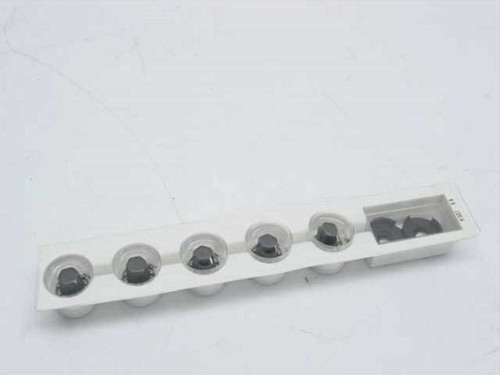 Dial Electronics H507-6A miniature rotary dial counters in original white plastic tray, 5-pack view showing all five units from above