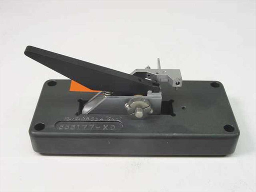 Wafer bonder assembly lever component 635177-XD – left side view showing black base and raised lever arm with orange label