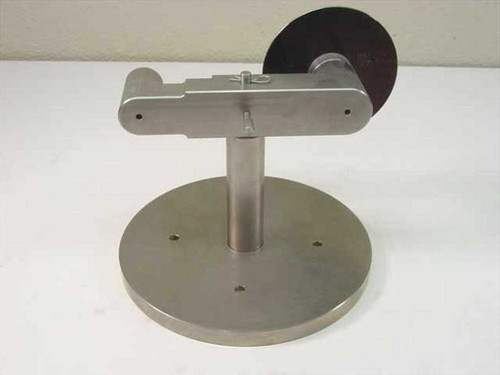 Custom Scientific stainless steel component holder stand — rear-left view showing reverse side of pivot arm assembly, locking thumbscrew detail, and three-hole round base
