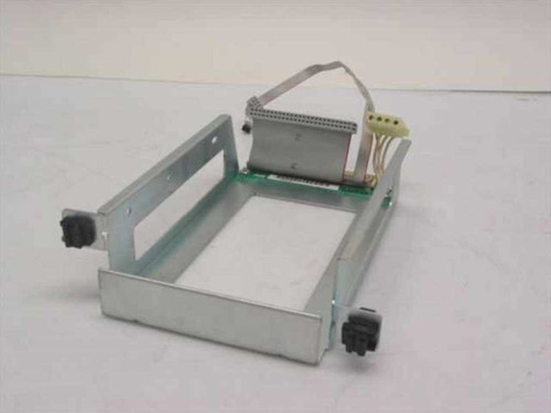 AST 202461-005C SCSI hot swap drive tray – top-down view showing open carrier frame, integrated backplane board, and power connector cables