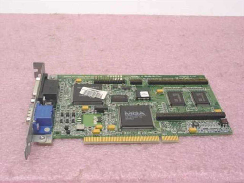 Compaq 223337-001 MGA PCI video card – top-down view showing Matrox MGA chip, RAM modules, and expandable memory slot on green PCB