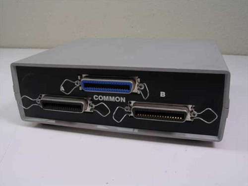 Inmac 0126 rear panel showing three Centronics 36-pin parallel connectors labeled Common and B