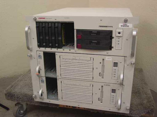 Compaq ProLiant CL1850 rack mount cluster server front view showing full chassis with hot-swap drive bays and lower node enclosures on a rolling cart