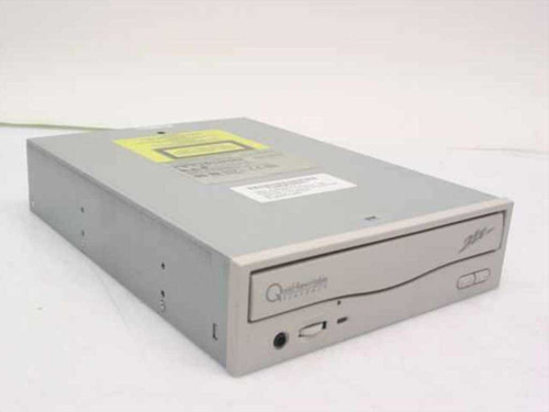 Wearnes Peripherals CDS-2420 24X internal CD-ROM drive – front panel view showing tray, headphone jack, and Quad Rewritable Playback branding