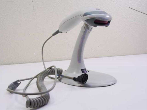 Metrologic MS9520 Voyager handheld laser barcode scanner on stand with coiled PowerLink cable