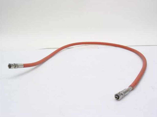 Orange 1/4-inch high pressure hose with compression fittings on both ends — full length side view