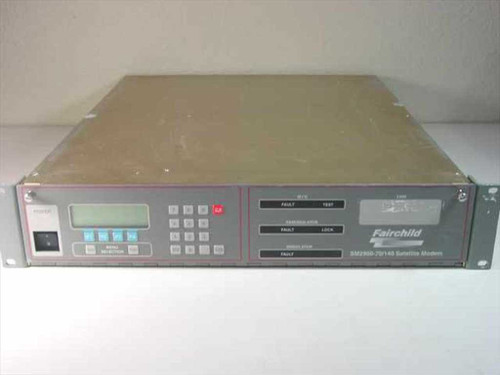 Fairchild SM2900 SM290 satellite modem front panel showing LCD display, keypad, and fault/test/lock indicators