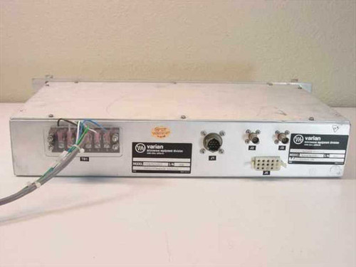 Varian VJC6767D8T7 Switch Control – rear panel view showing Varian Microwave Equipment Division labels, multi-pin connectors, and wiring harness