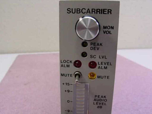 Scientific Atlanta 262180 Subcarrier Modulator — close-up of front panel showing SUBCARRIER label, MON VOL knob, Peak Dev, SC LVL, Lock Alm, Level Alm, and Mute LED indicators