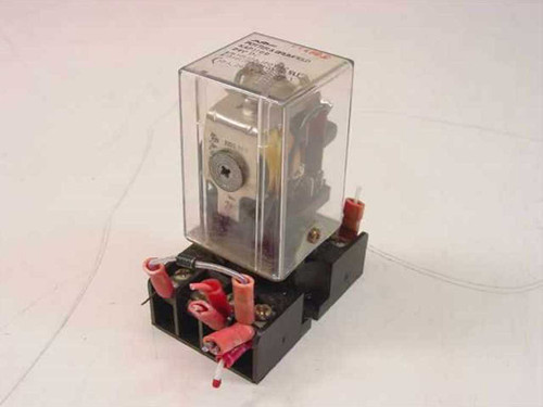 AMF Potter & Brumfield KAP11DG relay with clear plastic cover seated on black connection bracket socket — front-left view