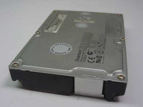 Quantum Fireball EX 6.4GB IDE hard drive – side view showing Quantum logo, warranty void sticker, and CE/UL markings