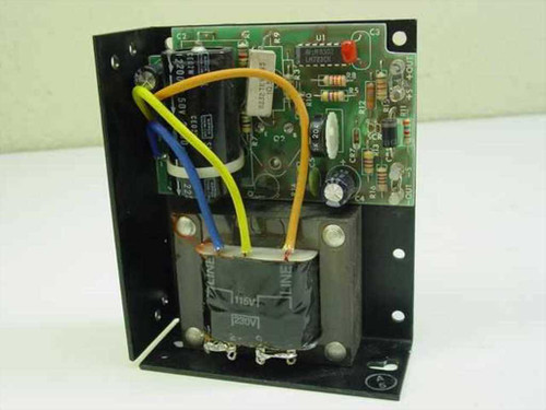 Elexon SOLV15-24 power supply module – interior view showing PCB, transformer with 115V/230V tap wiring, blue and yellow lead wires