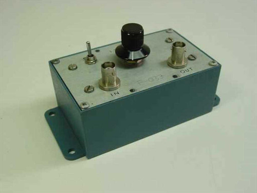Pomona Electronics F-033 1.25 MHz Band Pass Filter — angled top view showing BNC IN and OUT connectors, toggle switch, and tuning knob on teal metal enclosure
