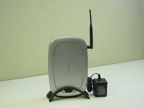 Netgear MR814 wireless router front view on desktop stand with detachable antenna and AC-DC power adapter alongside