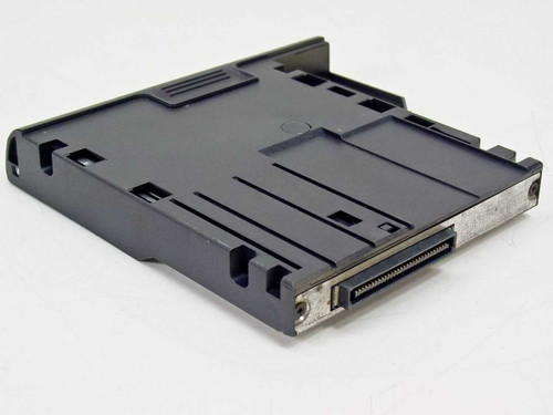 Dell 09YXE floppy disk drive module – rear angled view showing proprietary laptop bay edge connector