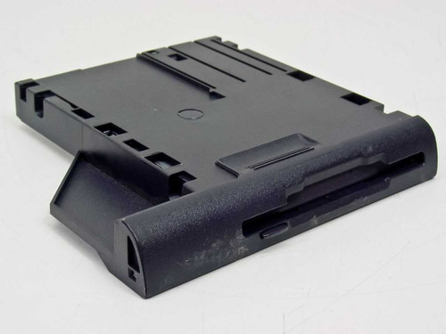 Dell 09YXE floppy disk drive module – top/front angled view showing drive slot and plastic bay housing