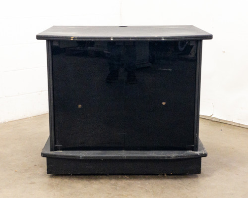 Multimedia TV cabinet – front view with black glass doors closed, showing both door panels and plinth base