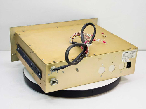 Vindicator RMC-2100 rear and side view showing back panel with power inlet, knockouts, and wiring harness routed over the gold chassis