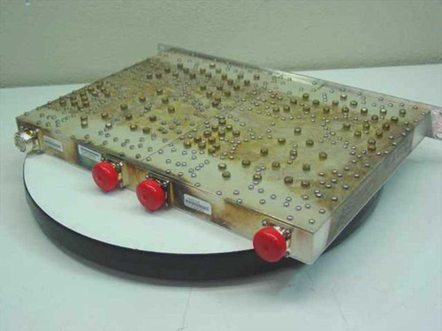 CCI DDP-1819-HP-1 Dual Duplexer top-down view showing exposed RF filter cavity array and three red-capped SMA connectors on rear edge