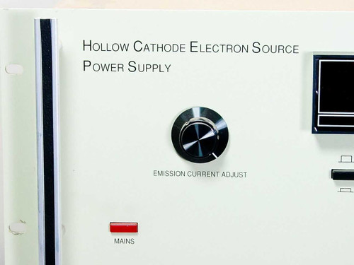 Commonwealth Scientific HCES 5000 front panel close-up showing Emission Current Adjust knob, Mains indicator lamp, and product label