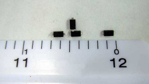 BZT52C30 30V 500mW SOD-123 SMD Zener diodes — three individual components shown next to ruler for scale