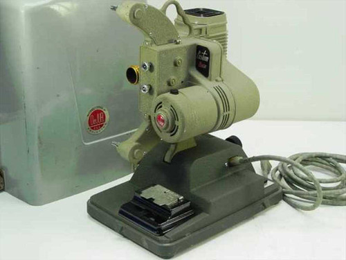 DeJur Amsco 750-B 8mm projector right side view with film gate and carry case visible alongside