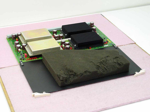 Silicon Graphics 303X2 Power Module Board angled view showing dual heat sinks and shielded transformer cans on green PCB