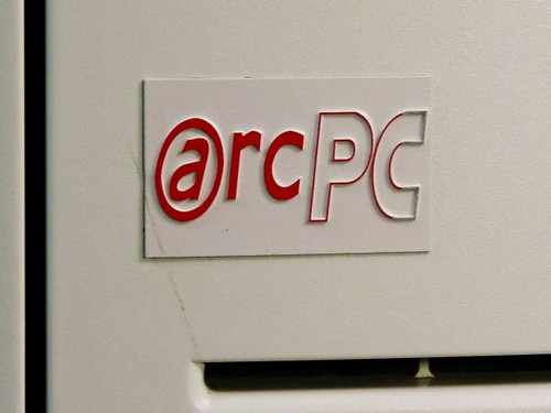 Arc PC server chassis – close-up of red and white Arc PC logo badge on front bezel