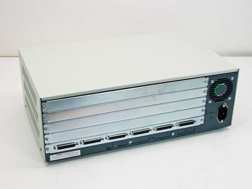 MICOM Marathon 1K 5001B/D Network Feeder Multiplexer — rear panel showing six DB25 connectors, IEC power inlet, and cooling fan