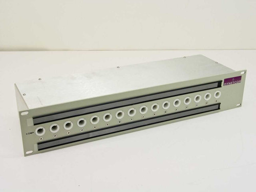 Dynetcom Dyna-Patch Mark-1 153-004B-16 16-channel patching module — front panel angled view showing single-hole monitoring ports and COMP label