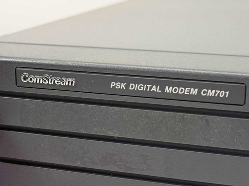ComStream PSK Digital Modem CM701 nameplate label close-up on front panel bezel