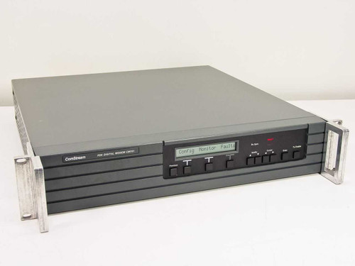 ComStream CM701 PSK Digital Satellite Modem front panel and rackmount chassis, 2U form factor with LCD display showing Config Monitor Fault menu
