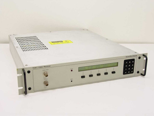Scientific Atlanta 7530I L-Band Video Receiver — front panel three-quarter view showing LCD display, keypad, and BNC connectors with rack ears installed