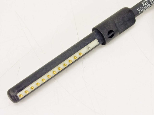 Dynatech DPC-12-3 cable — close-up of one proprietary inline connector showing gold spring-contact pins exposed along the connector body