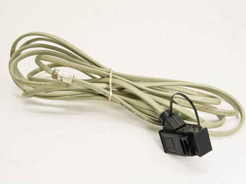 IBM 73G8856 POS cash register cable coiled view showing full 12.5 ft ivory cable with RJ11 and proprietary connectors