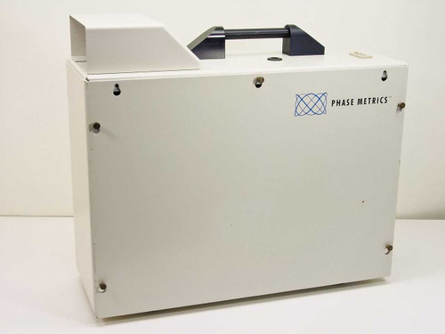 Phase Metrics Lamphouse 038050100B – right side exterior view showing Phase Metrics logo and carry handle