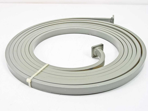 Micro-Coax 1029 WR-62 flexible waveguide delay line coiled view showing both square flanged terminations and overall coil profile