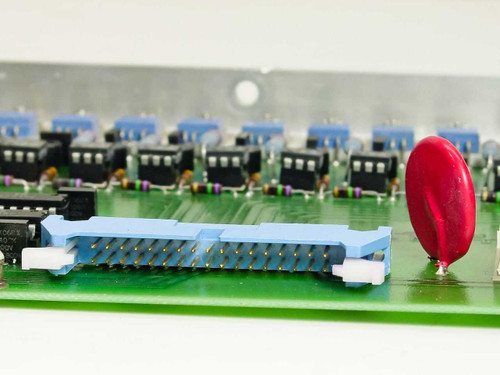 Varian 135935 Regulator Board – close-up of blue multi-pin card edge connector with gold contacts and red indicator component