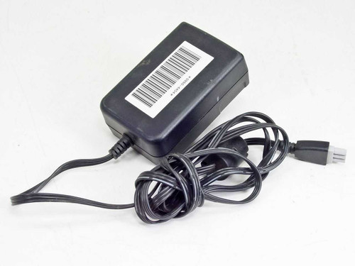 HP 0950-4404 printer power adapter — top angled view showing barcode label and output cable with proprietary connector