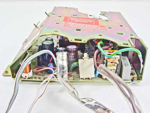 Radius 915-0159R Macintosh power supply — top-down view showing PCB, capacitors, transformer, and wire harness