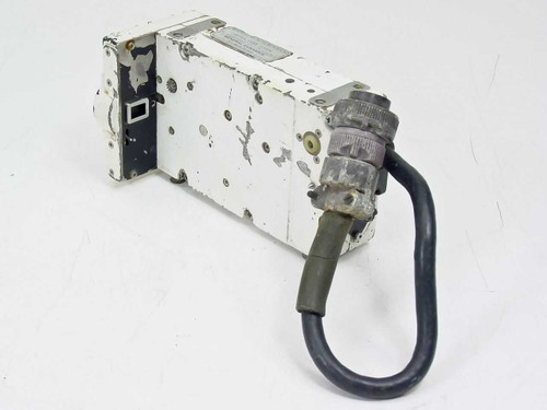 Traid Corp 1000-B 16mm Camera – rear/side view showing heavily worn white painted housing and MIL-spec circular connector with cable