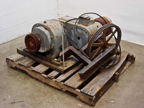 General Electric 7GP358MA3AA variable speed motor with gearbox and belt drive pulleys — full unit front-left view on wooden pallet